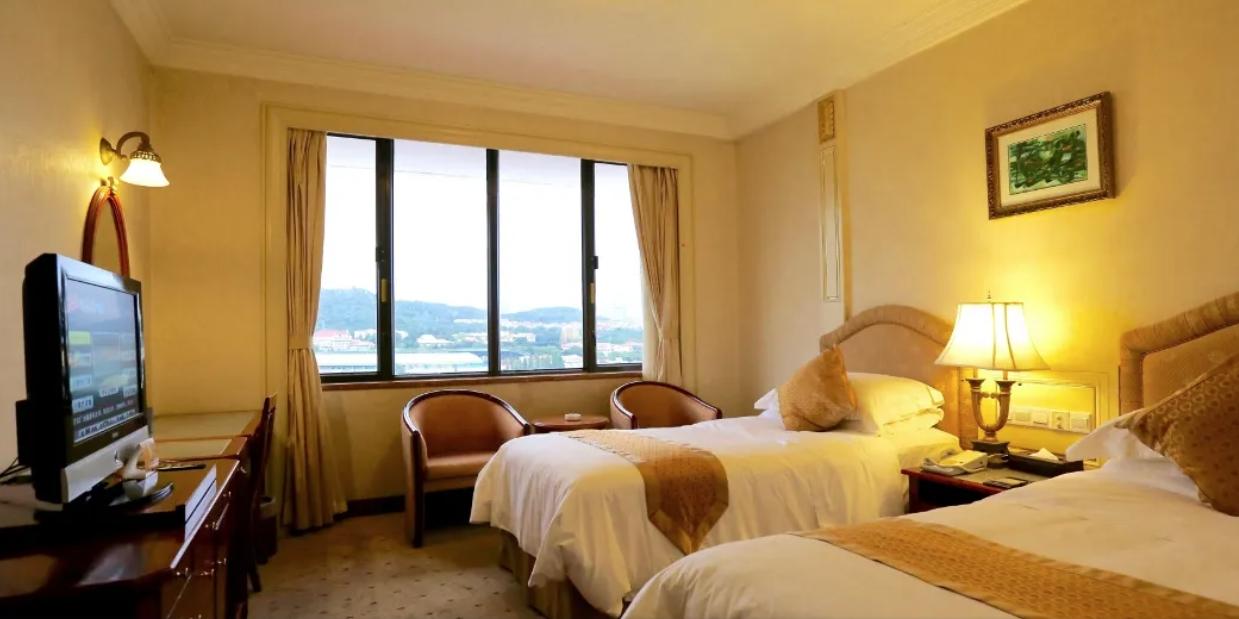 Huiquan Dynasty Hotel צ'ינגדאו מראה חיצוני תמונה