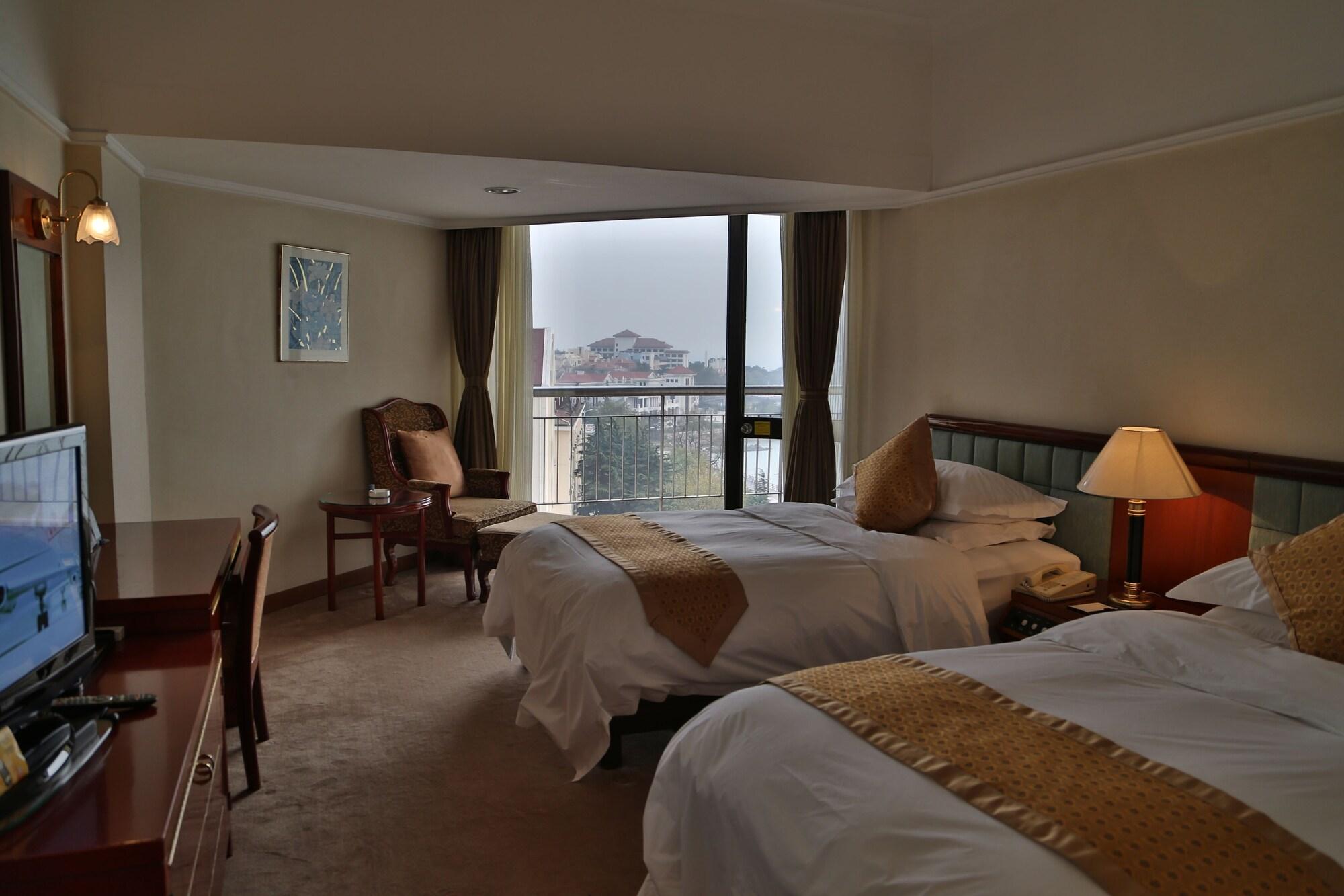 Huiquan Dynasty Hotel צ'ינגדאו מראה חיצוני תמונה