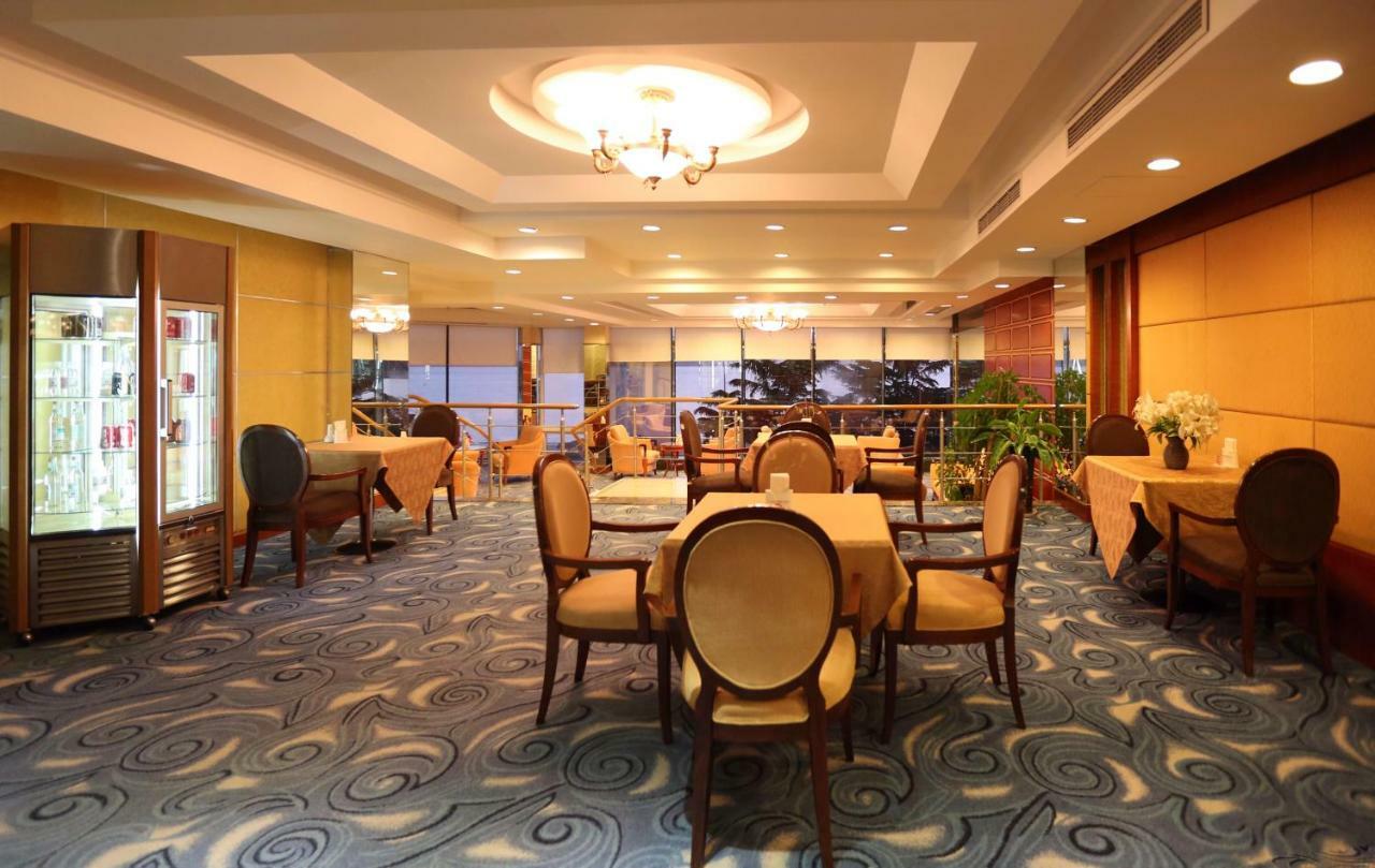 Huiquan Dynasty Hotel צ'ינגדאו מראה חיצוני תמונה